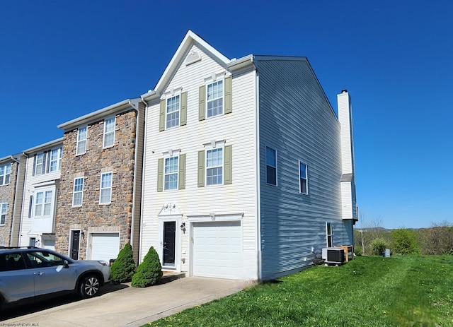 141 Birds Eye View Dr, Morgantown, WV 26501 - multi unit property featuring a garage, central AC unit, a chimney, stone siding, and concrete driveway