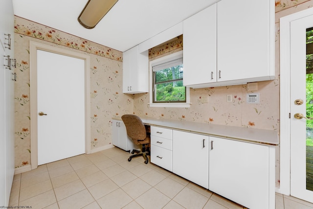 237 Highland Ave, Grafton, WV 26354 - unfurnished office with built in study area, wallpapered walls, baseboards, and light tile patterned flooring