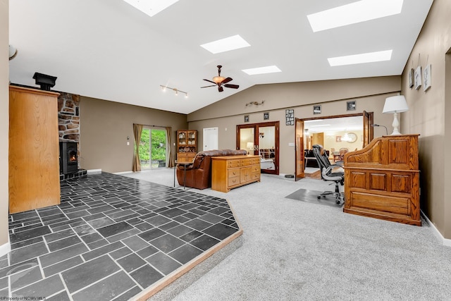 237 Highland Ave, Grafton, WV 26354 - office space with a skylight, vaulted ceiling, and a wood stove
