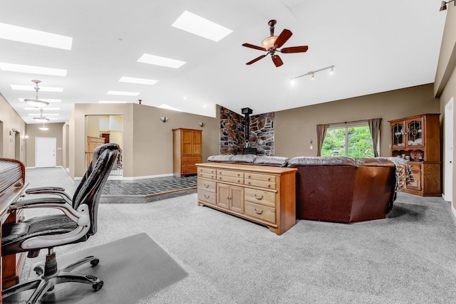 237 Highland Ave, Grafton, WV 26354 - office featuring a skylight, vaulted ceiling, ceiling fan, carpet floors, and baseboards