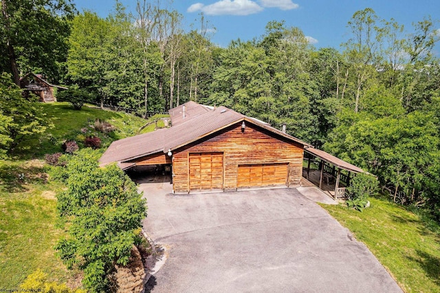 237 Highland Ave, Grafton, WV 26354 - chalet / cabin with a wooded view and asphalt driveway