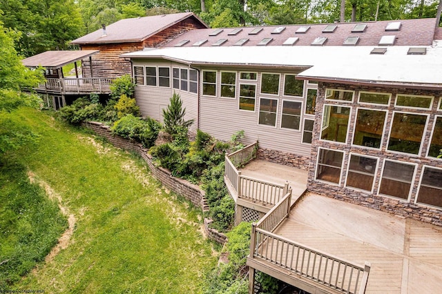 237 Highland Ave, Grafton, WV 26354 - rear view of property with a wooden deck and a lawn