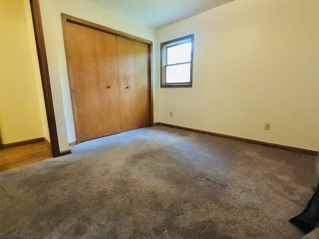 183 Camp Mountaineer Rd, Morgantown, WV 26508 - unfurnished bedroom with carpet, baseboards, and a closet