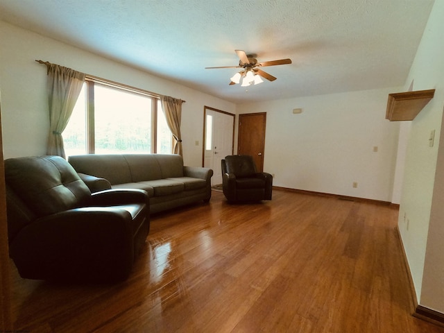 183 Camp Mountaineer Rd, Morgantown, WV 26508 - living room with a ceiling fan, wood finished floors, and baseboards