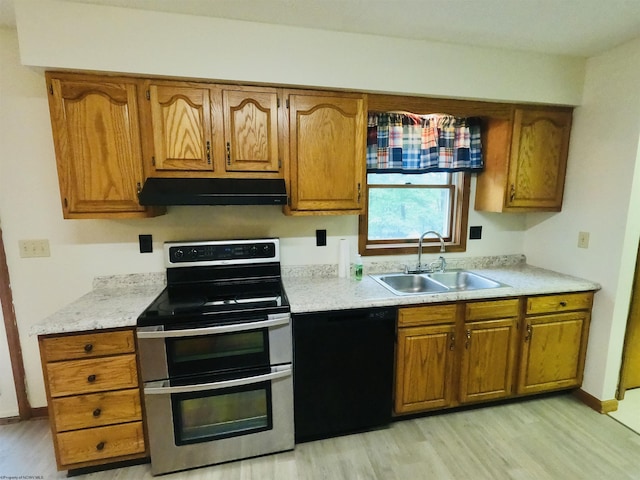 183 Camp Mountaineer Rd, Morgantown, WV 26508 - kitchen featuring under cabinet range hood, double oven range, a sink, and brown cabinetry
