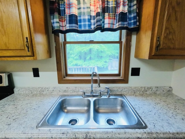 183 Camp Mountaineer Rd, Morgantown, WV 26508 - kitchen featuring a sink and brown cabinetry
