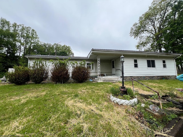 15 Carl Zinn Rd, Independence, WV 26374 - rear view of house featuring a lawn and a porch