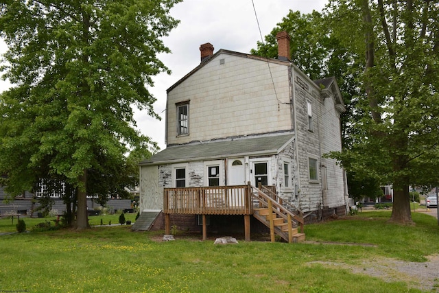 1501 Main St, Wellsburg, WV 26070 - back of property featuring a lawn, a chimney, and a wooden deck