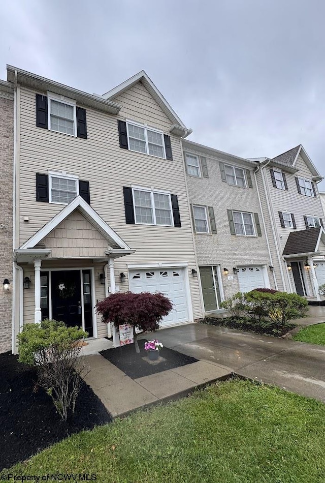 203 Tarbert Ct, Morgantown, WV 26508 - townhome / multi-family property featuring driveway and a garage