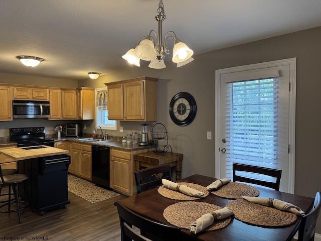 203 Tarbert Ct, Morgantown, WV 26508 - kitchen featuring black appliances, a chandelier, butcher block countertops, a sink, and dark wood finished floors