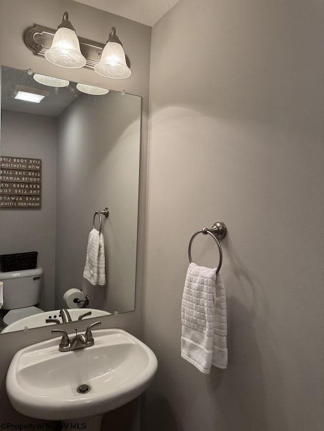 203 Tarbert Ct, Morgantown, WV 26508 - half bathroom with a sink and toilet