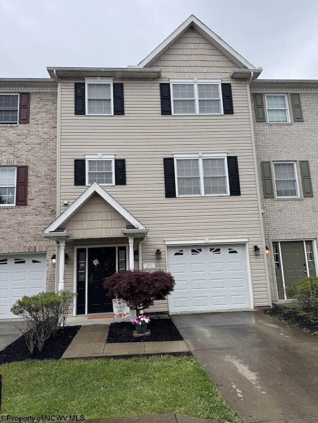 203 Tarbert Ct, Morgantown, WV 26508 - view of property with driveway and a garage