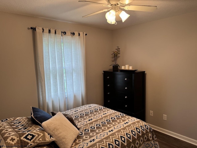 203 Tarbert Ct, Morgantown, WV 26508 - bedroom with dark wood finished floors, baseboards, and ceiling fan