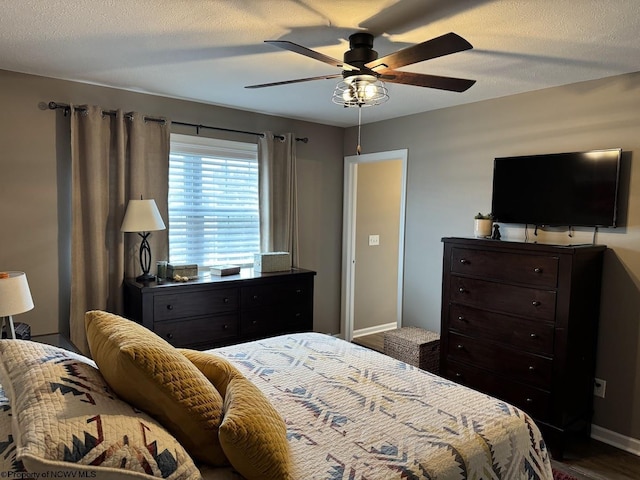 203 Tarbert Ct, Morgantown, WV 26508 - bedroom with baseboards, ceiling fan, and wood finished floors