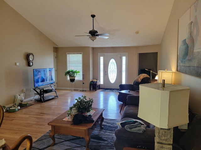 110 Woodmont Way, Fairmont, WV 26554 - living area with lofted ceiling, wood finished floors, ceiling fan, and baseboards