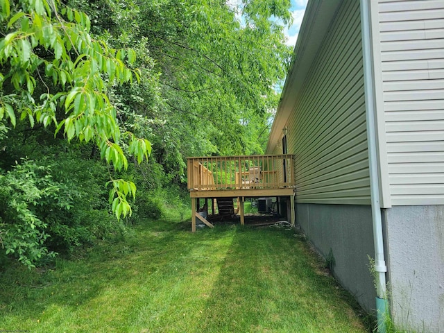 110 Woodmont Way, Fairmont, WV 26554 - view of green lawn featuring a wooden deck and central air condition unit