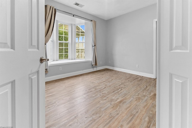 1318 Suncrest Vlg, Morgantown, WV 26505 - spare room featuring light wood-style flooring and baseboards