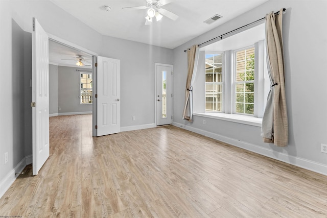 1318 Suncrest Vlg, Morgantown, WV 26505 - empty room with ceiling fan, light wood-style floors, and baseboards