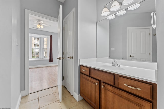1318 Suncrest Vlg, Morgantown, WV 26505 - bathroom with vanity, baseboards, a ceiling fan, and tile patterned flooring