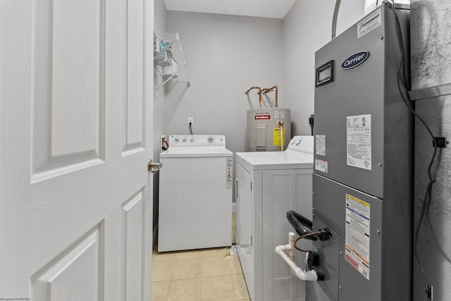 1318 Suncrest Vlg, Morgantown, WV 26505 - laundry room with washer and clothes dryer, heating unit, water heater, and light tile patterned flooring