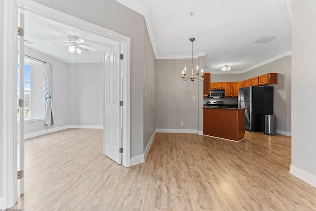 1318 Suncrest Vlg, Morgantown, WV 26505 - kitchen with freestanding refrigerator, open floor plan, brown cabinets, a chandelier, and ornamental molding