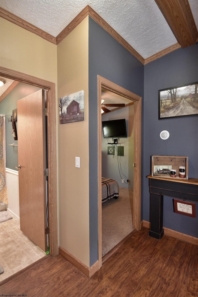 267 W Fork St, Clarksburg, WV 26301 - hall featuring wood finished floors, a textured ceiling, ornamental molding, and baseboards