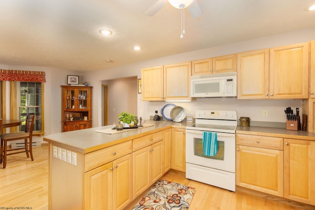 390 Aster Cir, Terra Alta, WV 26764 - kitchen featuring white appliances, light brown cabinets, light wood-style floors, a peninsula, and recessed lighting