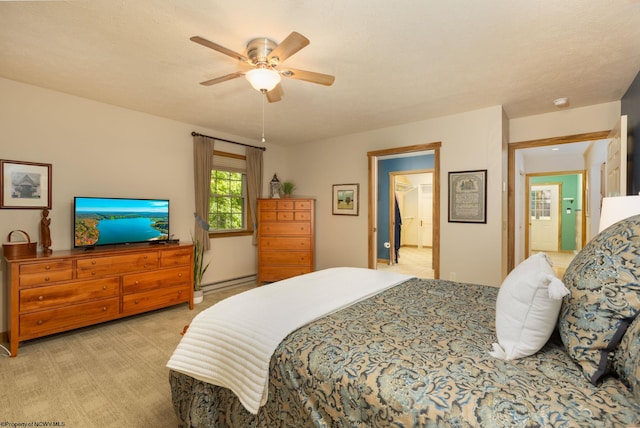 390 Aster Cir, Terra Alta, WV 26764 - bedroom with light carpet, a baseboard heating unit, and ceiling fan