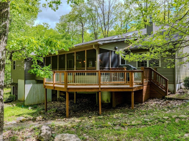 390 Aster Cir, Terra Alta, WV 26764 - rear view of house featuring a sunroom, a deck, and a chimney