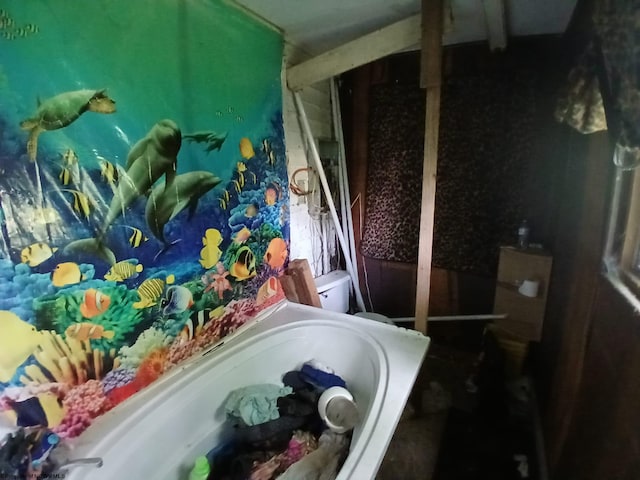 1738 Charleston Ave, Huntington, WV 25701 - bathroom featuring toilet and a tub to relax in