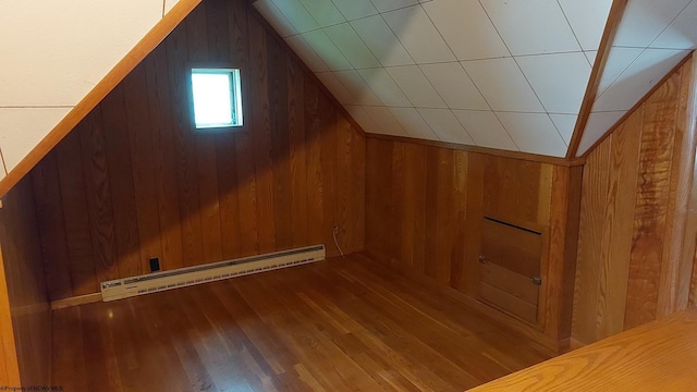 110 15th St, Elkins, WV 26241 - additional living space featuring a baseboard heating unit, wood walls, lofted ceiling, and wood finished floors