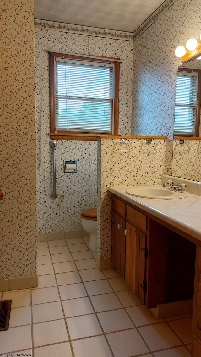 110 15th St, Elkins, WV 26241 - bathroom featuring wallpapered walls, vanity, tile patterned floors, and toilet