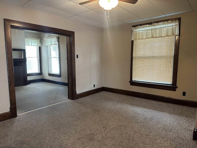 820 Field St, Fairmont, WV 26554 - spare room featuring carpet, a paneled ceiling, ceiling fan, and baseboards