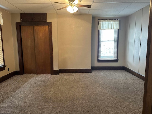 820 Field St, Fairmont, WV 26554 - unfurnished room with a paneled ceiling, carpet flooring, baseboards, and a ceiling fan