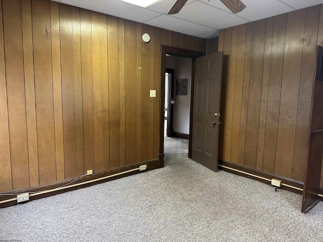 820 Field St, Fairmont, WV 26554 - unfurnished room with carpet, wood walls, and ceiling fan
