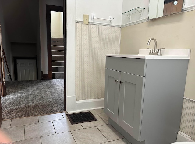 820 Field St, Fairmont, WV 26554 - bathroom featuring vanity, wainscoting, and tile patterned flooring