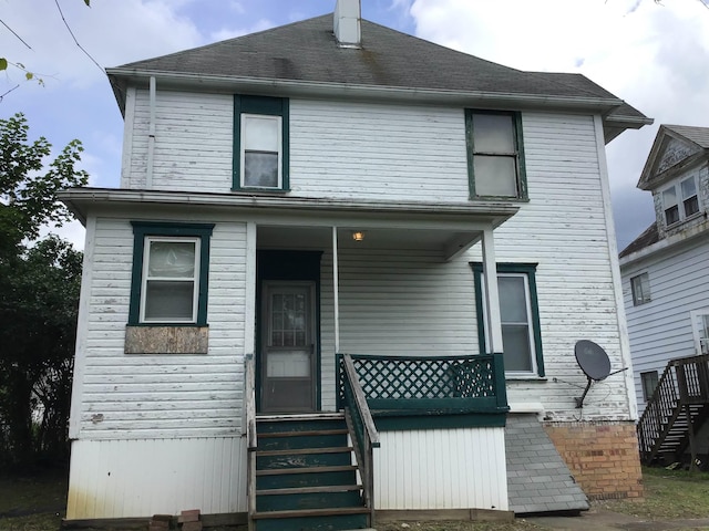 820 Field St, Fairmont, WV 26554 - rear view of property featuring stairway and covered porch