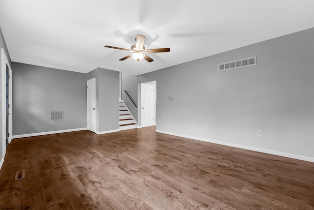 135 Celtic Dr, Clarksburg, WV 26301 - spare room featuring a ceiling fan, wood finished floors, stairs, and baseboards
