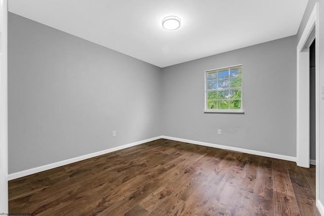 135 Celtic Dr, Clarksburg, WV 26301 - unfurnished bedroom with dark wood finished floors and baseboards