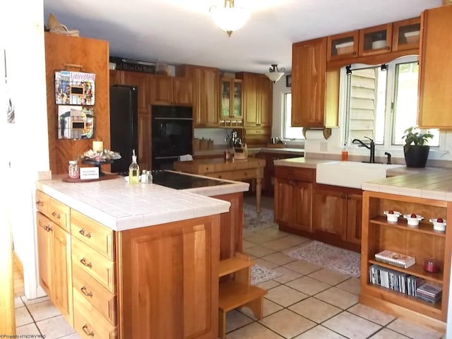 444 Gordon Rd, Beverly, WV 26253 - kitchen featuring open shelves, light tile patterned floors, a sink, brown cabinetry, and a peninsula