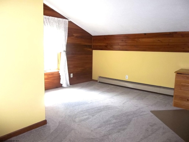444 Gordon Rd, Beverly, WV 26253 - bonus room with a baseboard heating unit, wooden walls, vaulted ceiling, carpet flooring, and baseboards