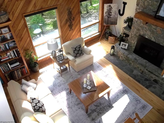 444 Gordon Rd, Beverly, WV 26253 - living area with a fireplace, wood finished floors, and wood walls