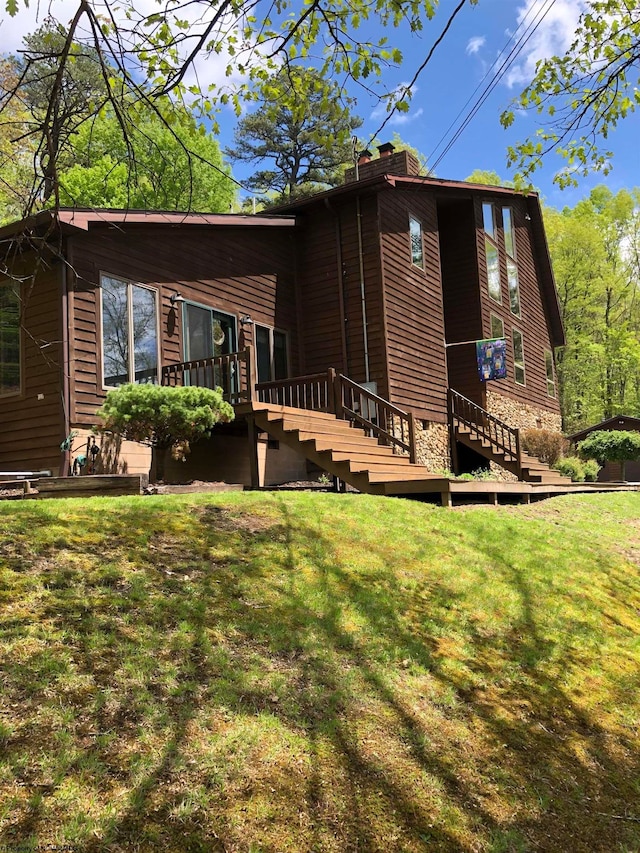 444 Gordon Rd, Beverly, WV 26253 - rear view of property featuring stairs, a chimney, a lawn, and a deck