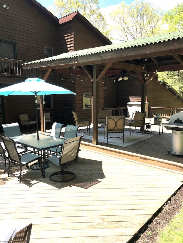 444 Gordon Rd, Beverly, WV 26253 - wooden deck with a gazebo, a ceiling fan, outdoor dining area, an outdoor hangout area, and grilling area