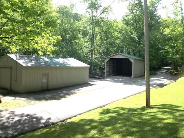 444 Gordon Rd, Beverly, WV 26253 - view of outdoor structure with a carport and a forest view