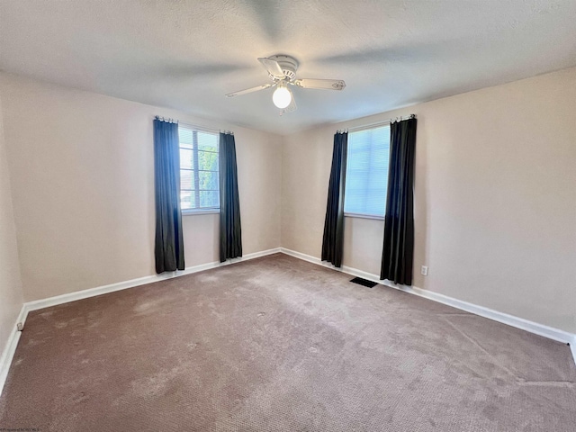600 Wilson St, Elkins, WV 26241 - carpeted spare room featuring baseboards and ceiling fan