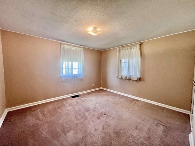 600 Wilson St, Elkins, WV 26241 - carpeted empty room featuring baseboards and a textured ceiling