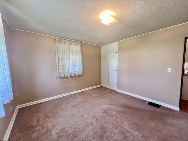 600 Wilson St, Elkins, WV 26241 - carpeted spare room with baseboards and a textured ceiling