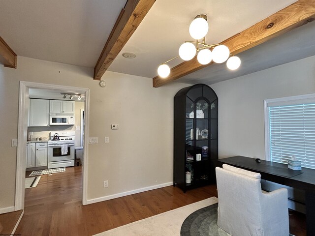 420 Fairfax Ave, Davis, WV 26260 - dining room featuring beamed ceiling, dark wood-style floors, baseboards, and arched walkways