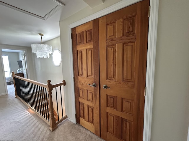 420 Fairfax Ave, Davis, WV 26260 - corridor featuring an upstairs landing, light carpet, attic access, baseboards, and a chandelier